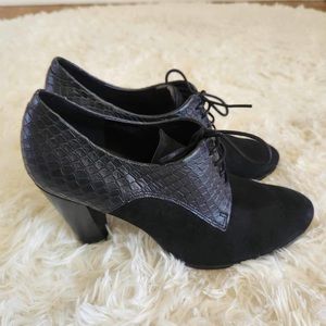 Like new black Ecco booties. These are crocodile inspired leather and suede.